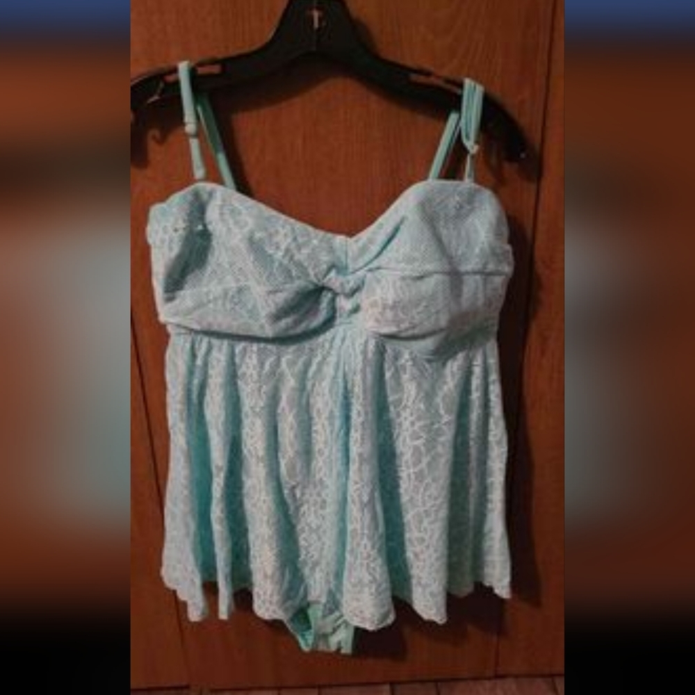 Size 14 light green one piece bathing suit.